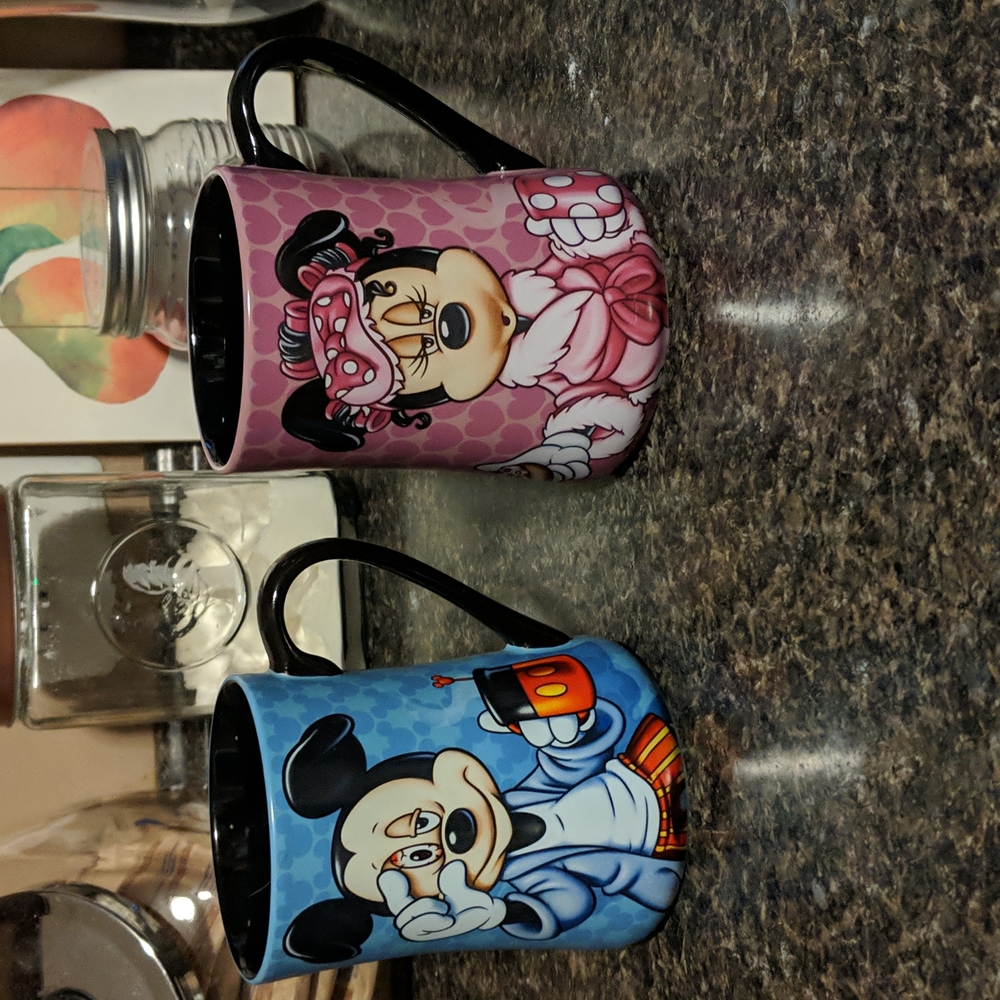 Matching mickey and Minnie mouse mugs